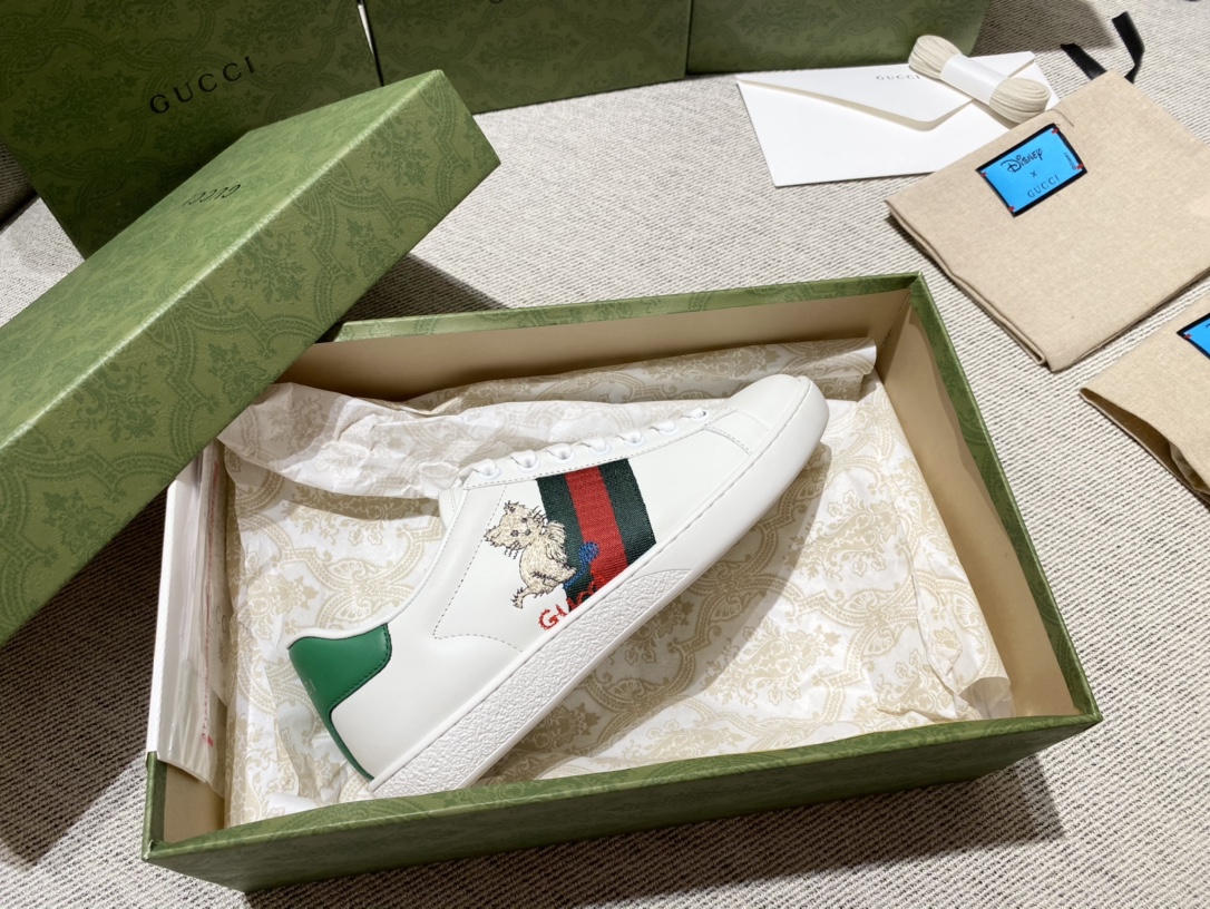G*u*i sneakers