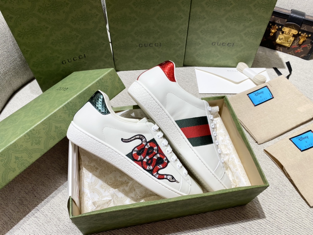 G*u*i sneakers