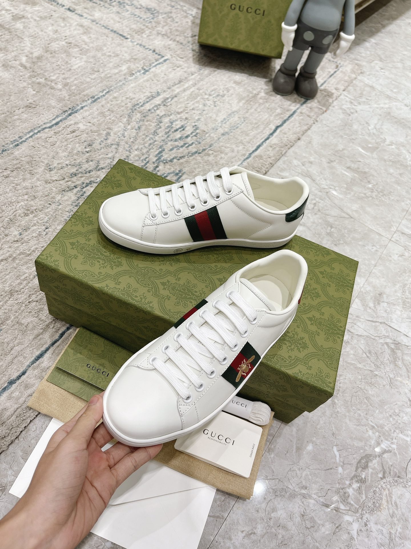 G*u*i sneakers