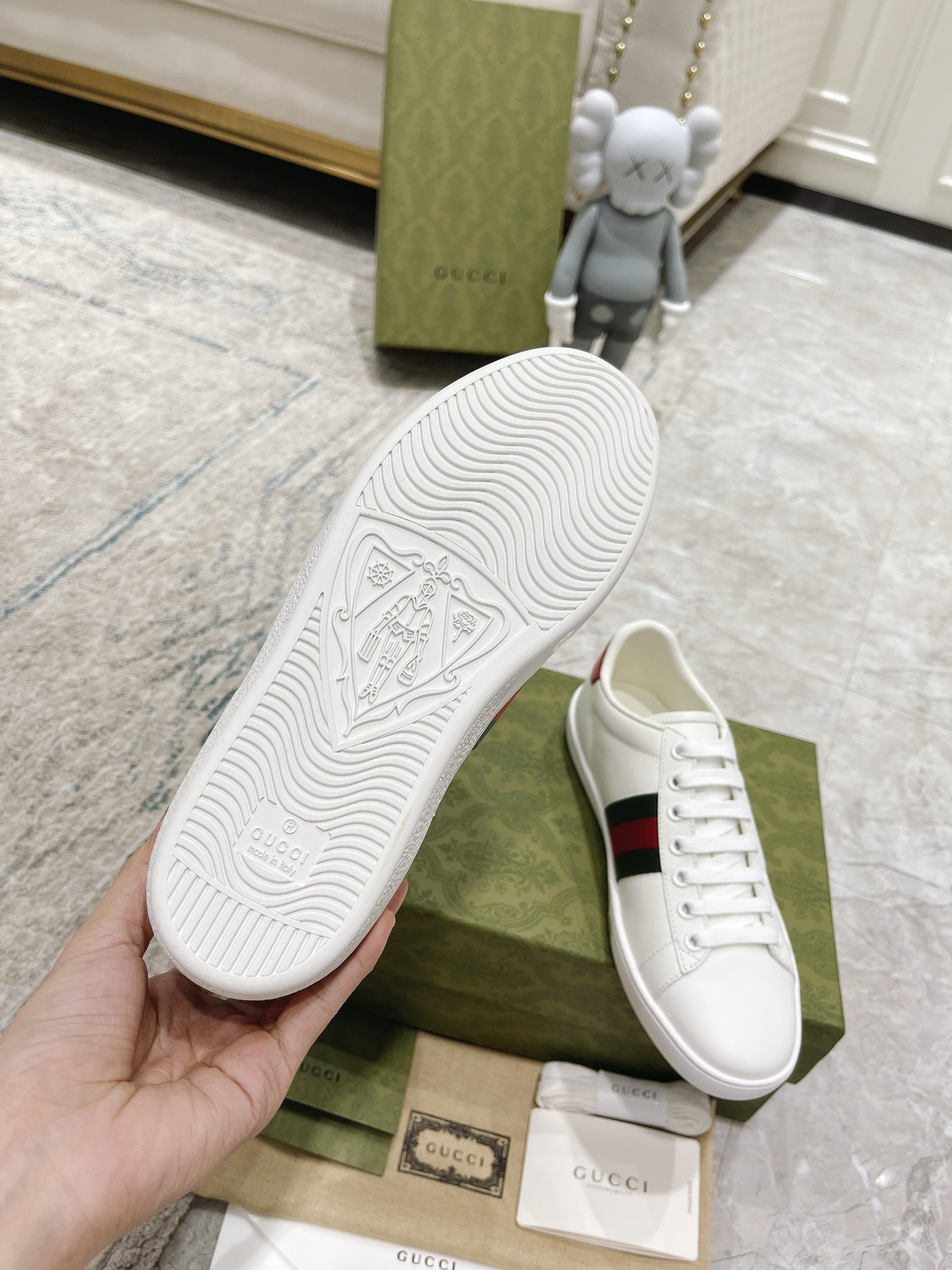 G*u*i sneakers