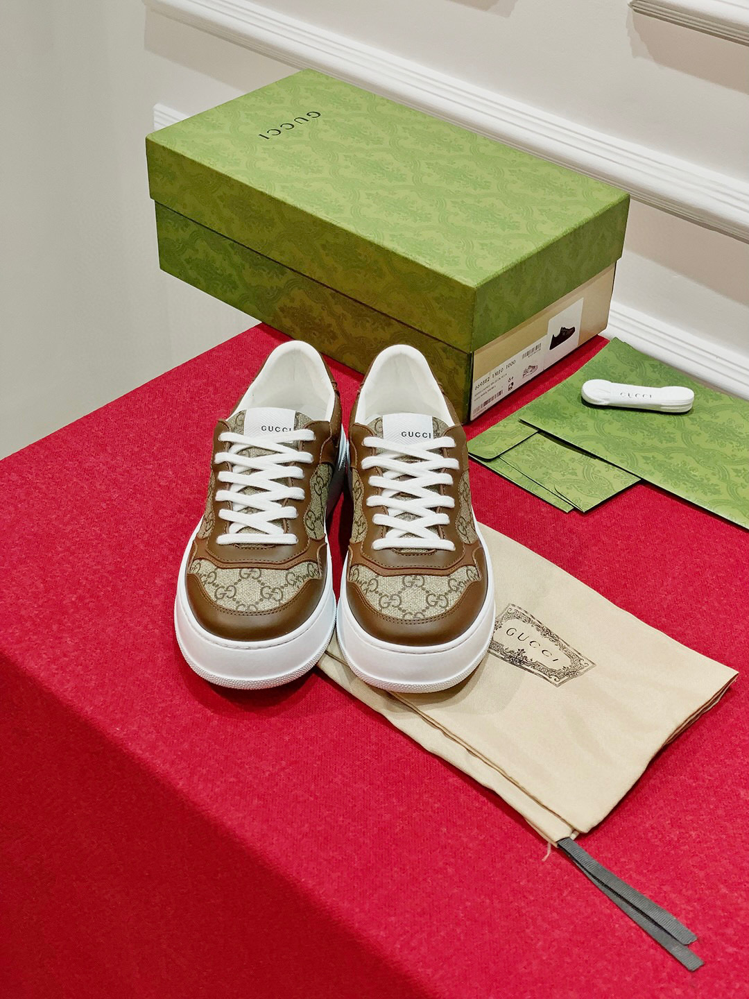 G*u*i sneakers