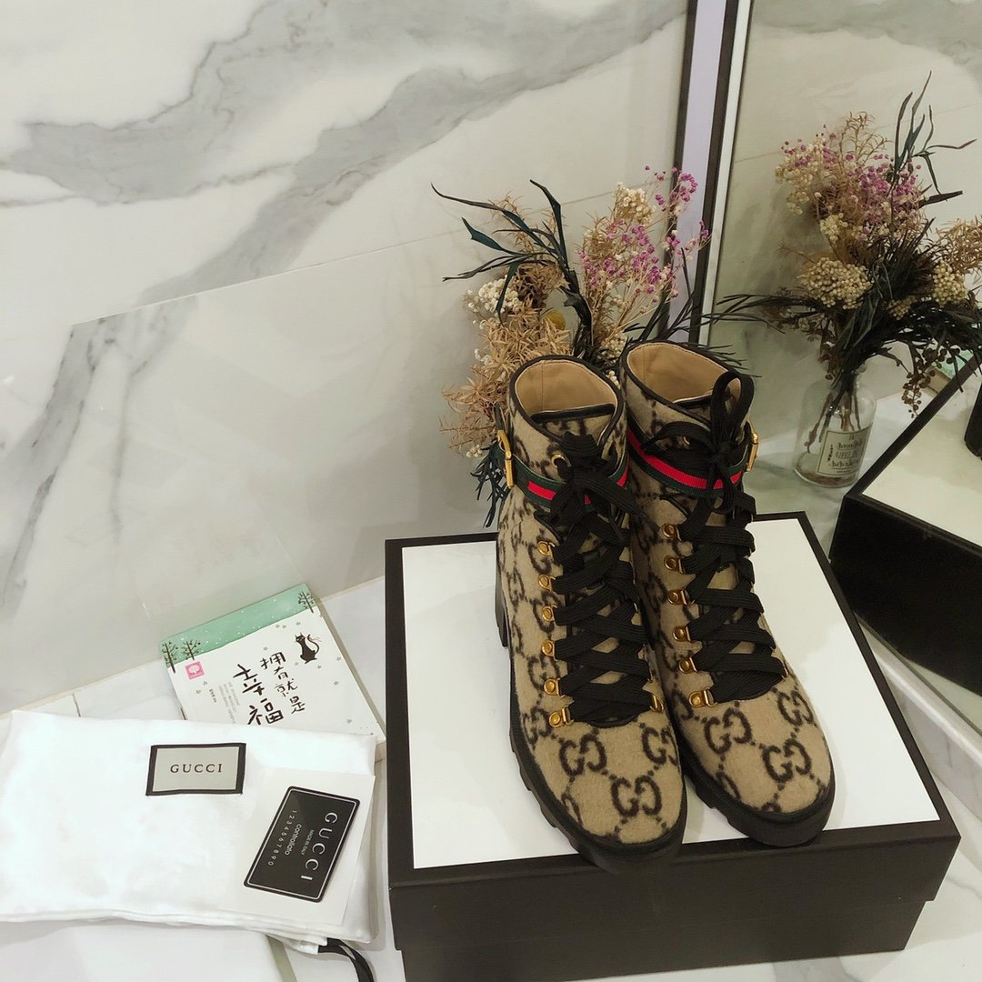G*u*i boots