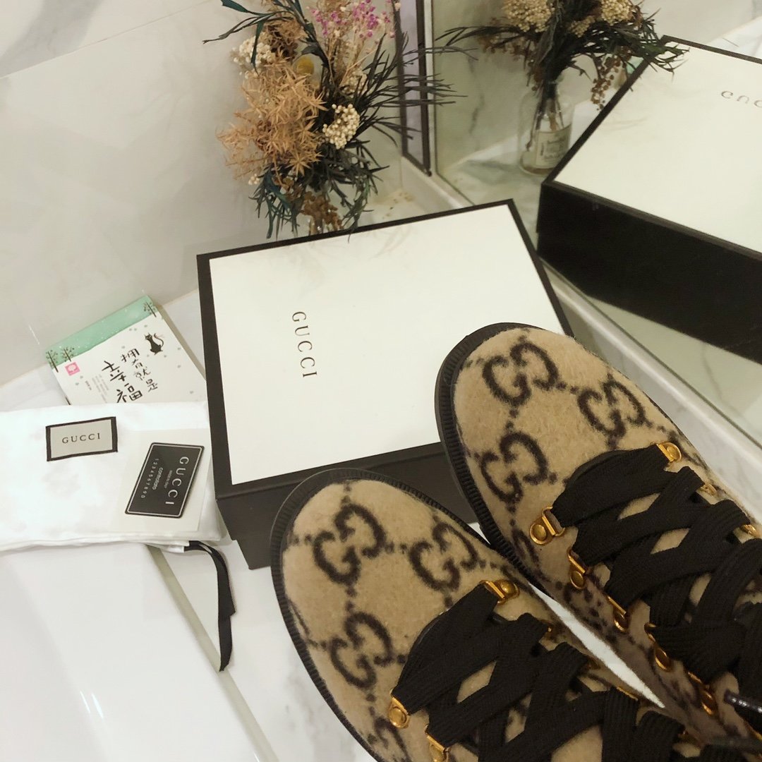 G*u*i boots