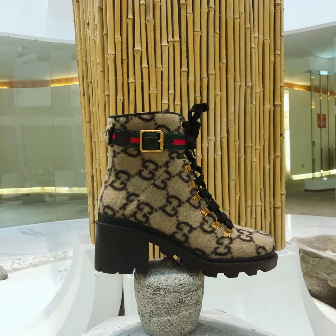 G*u*i boots