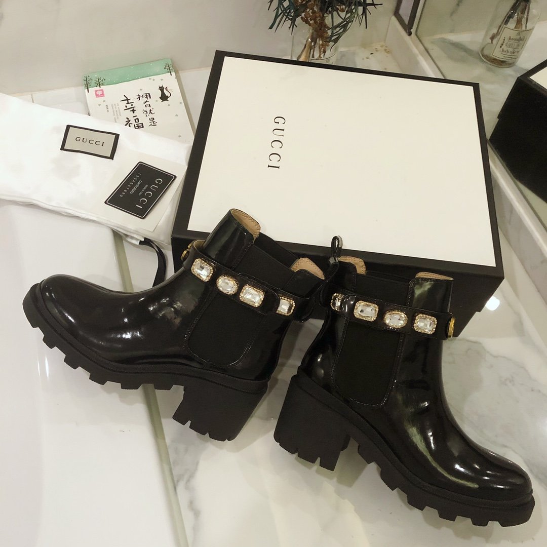 G*u*i boots