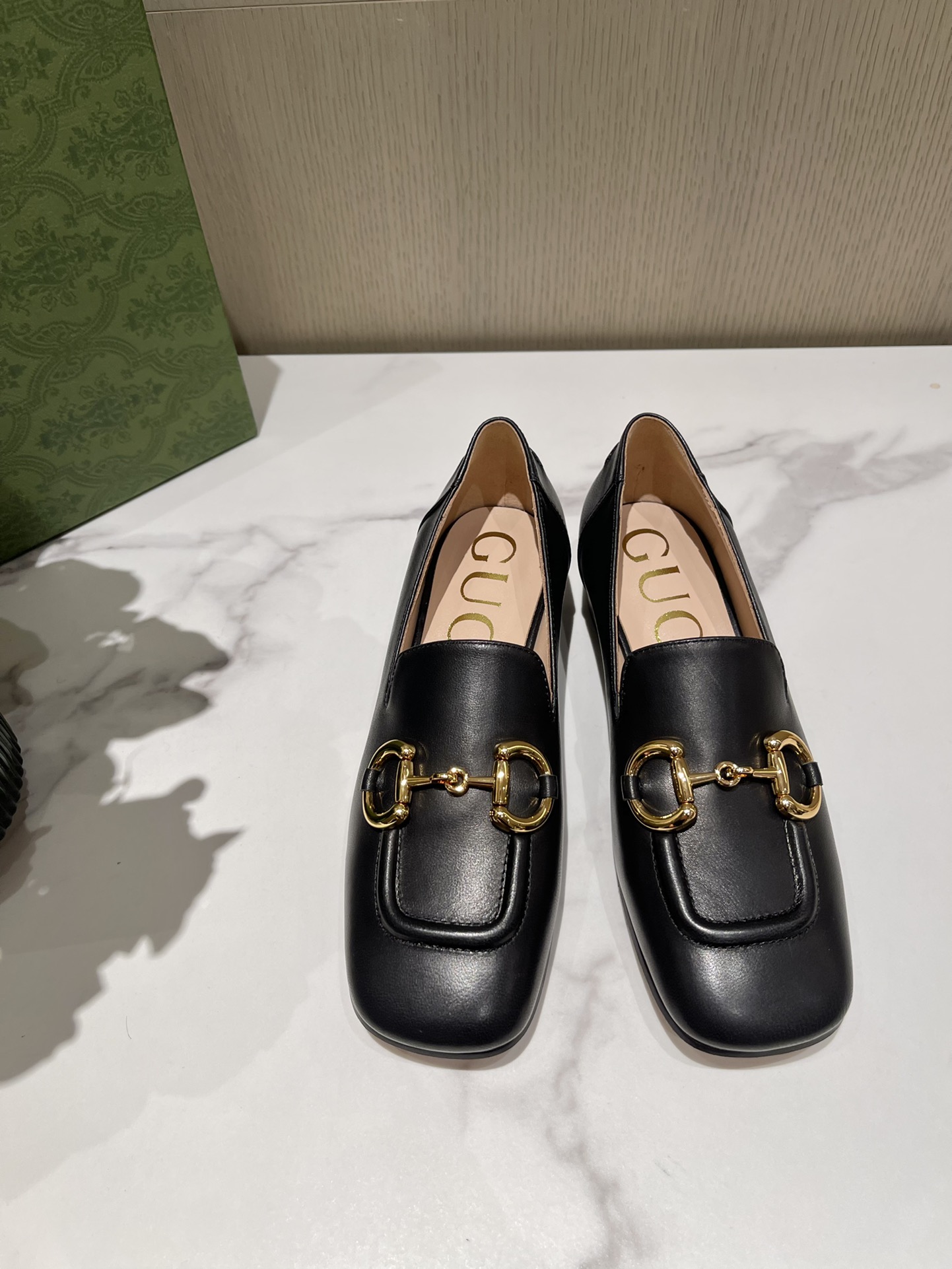 G*u*i loafers