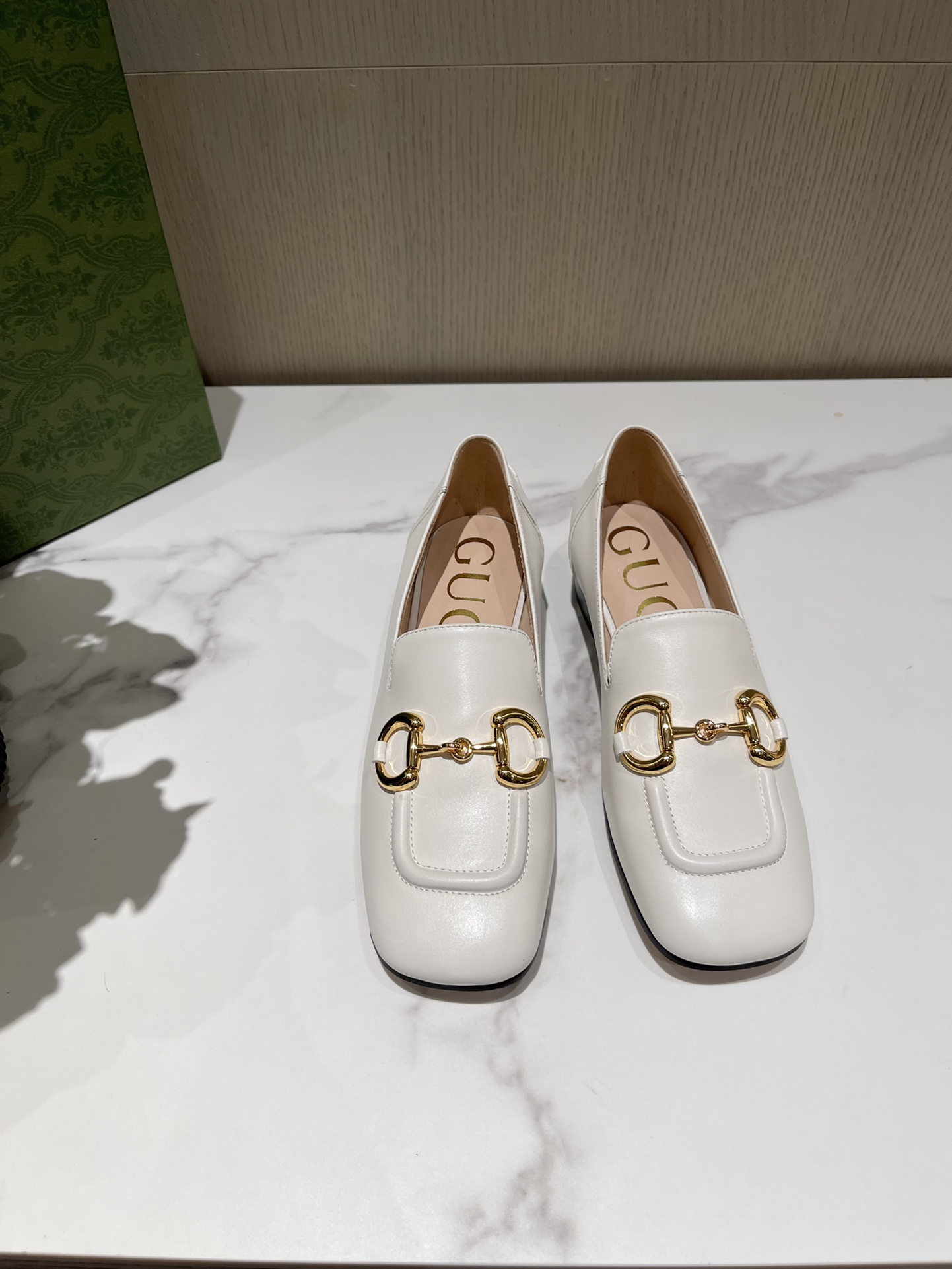 G*u*i loafers