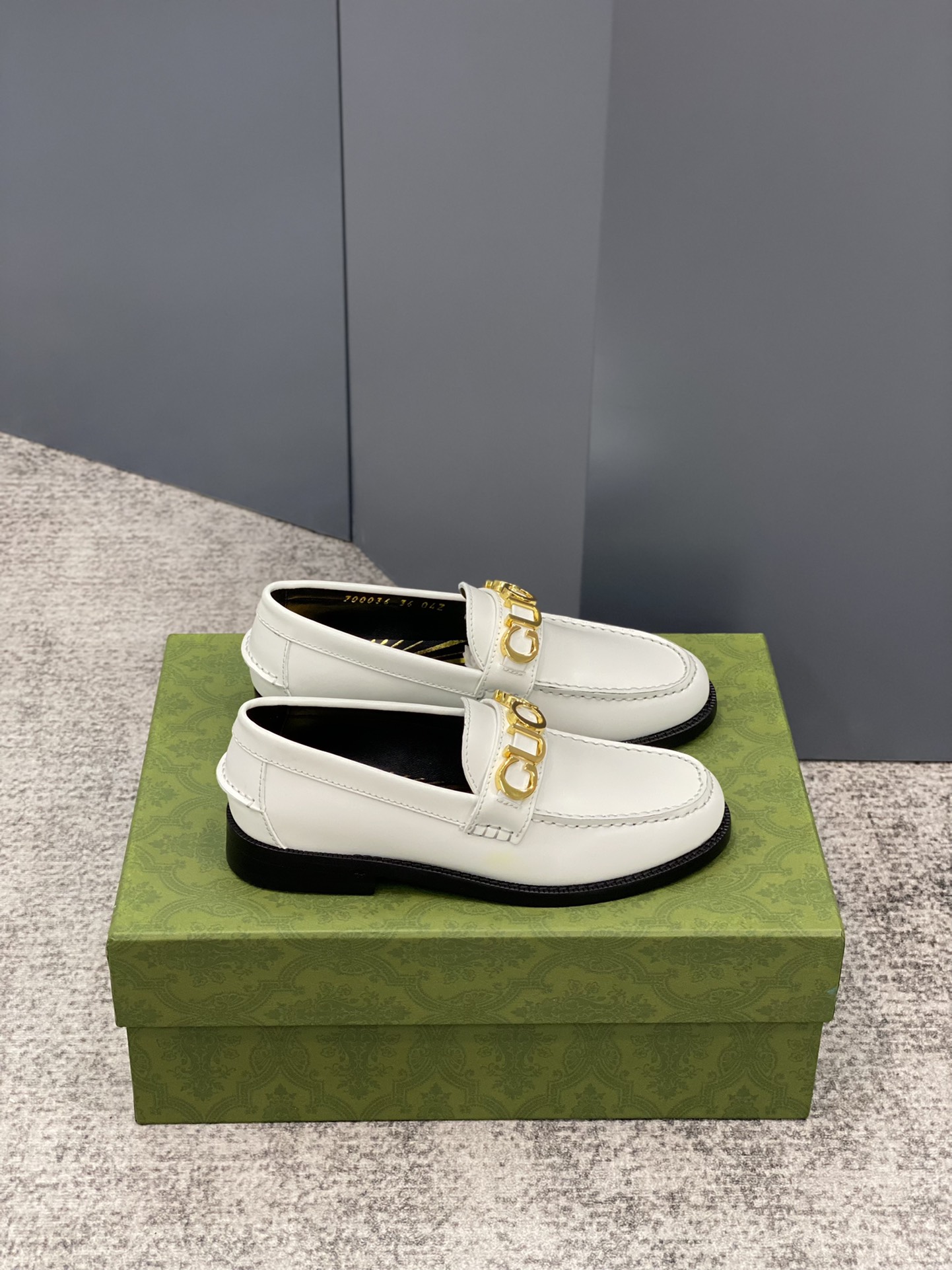 G*u*i loafers