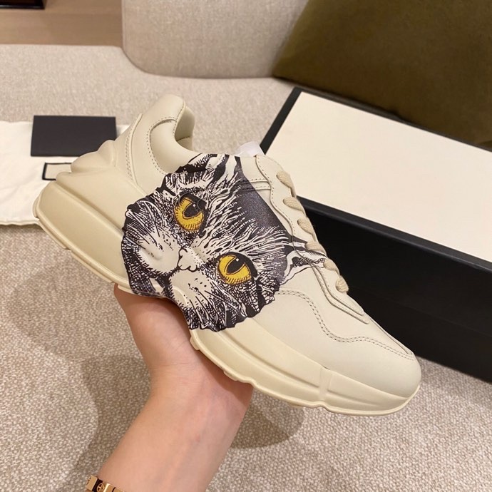 G*u*i sneakers