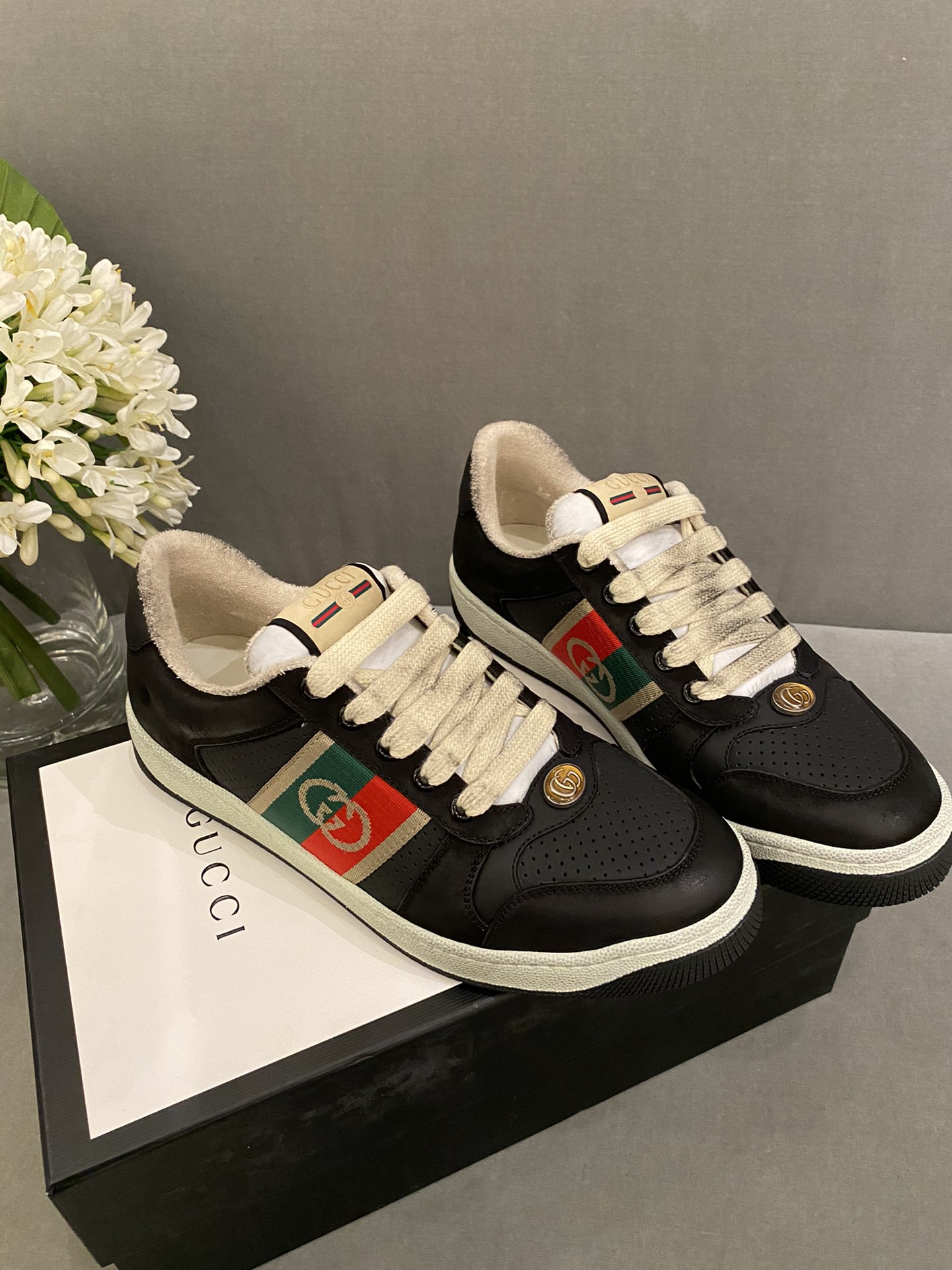 G*u*i sneakers