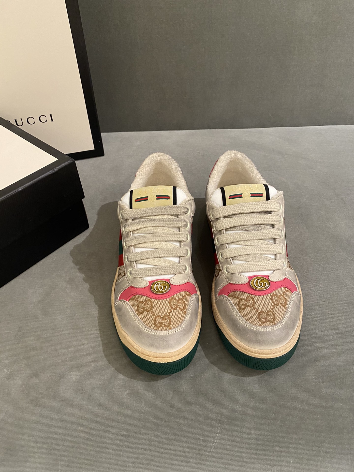G*u*i sneakers