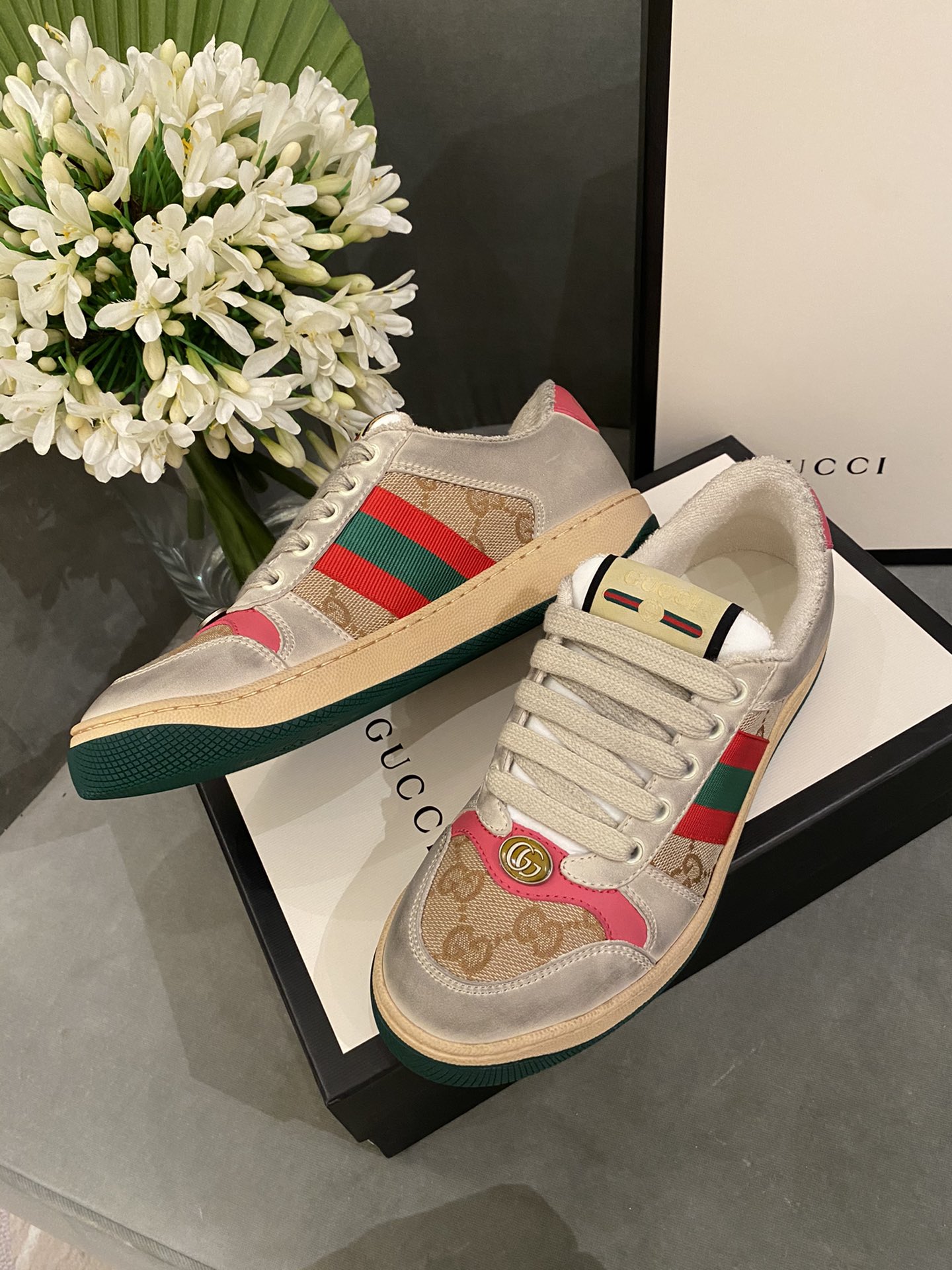 G*u*i sneakers