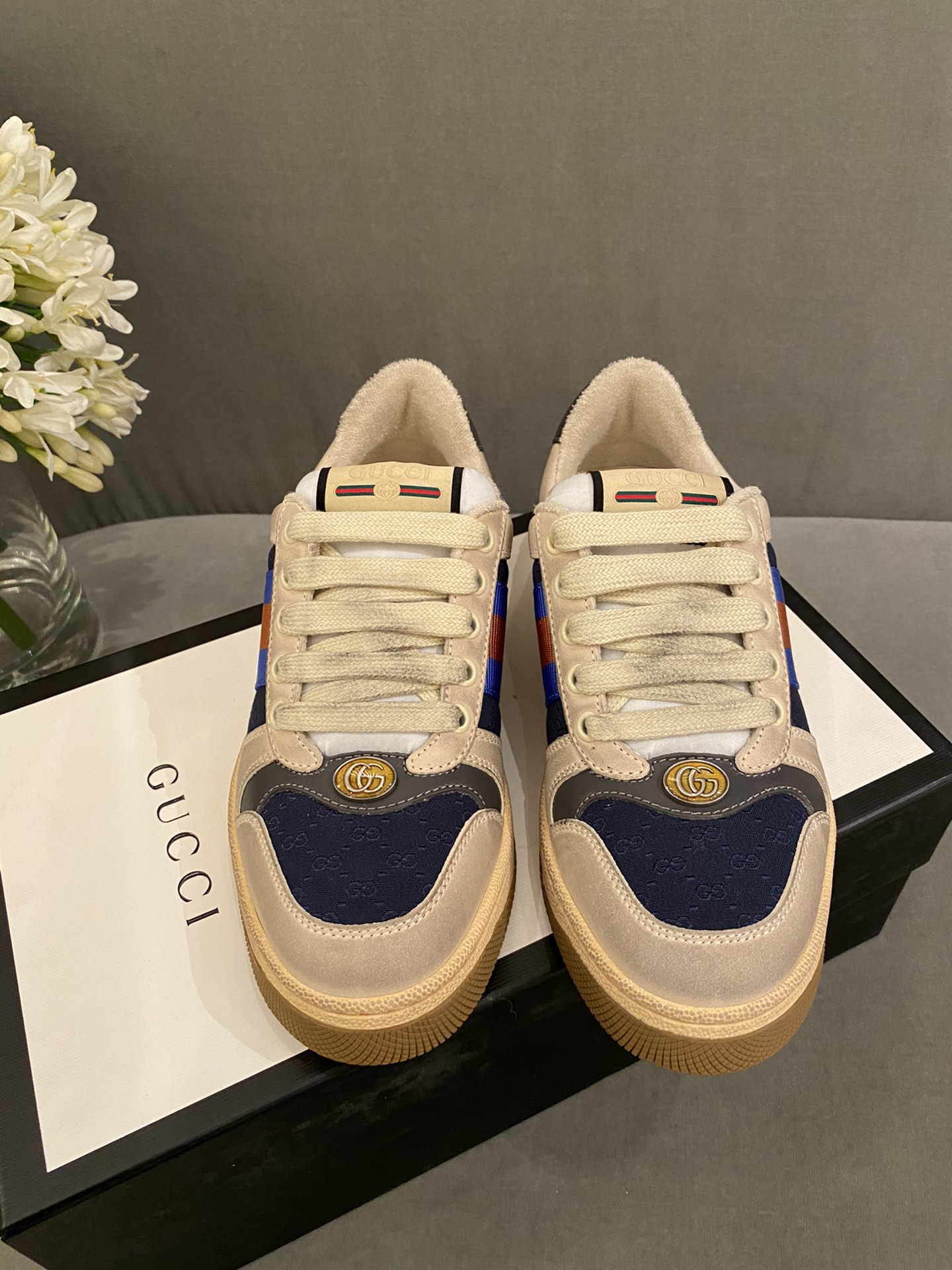 G*u*i sneakers