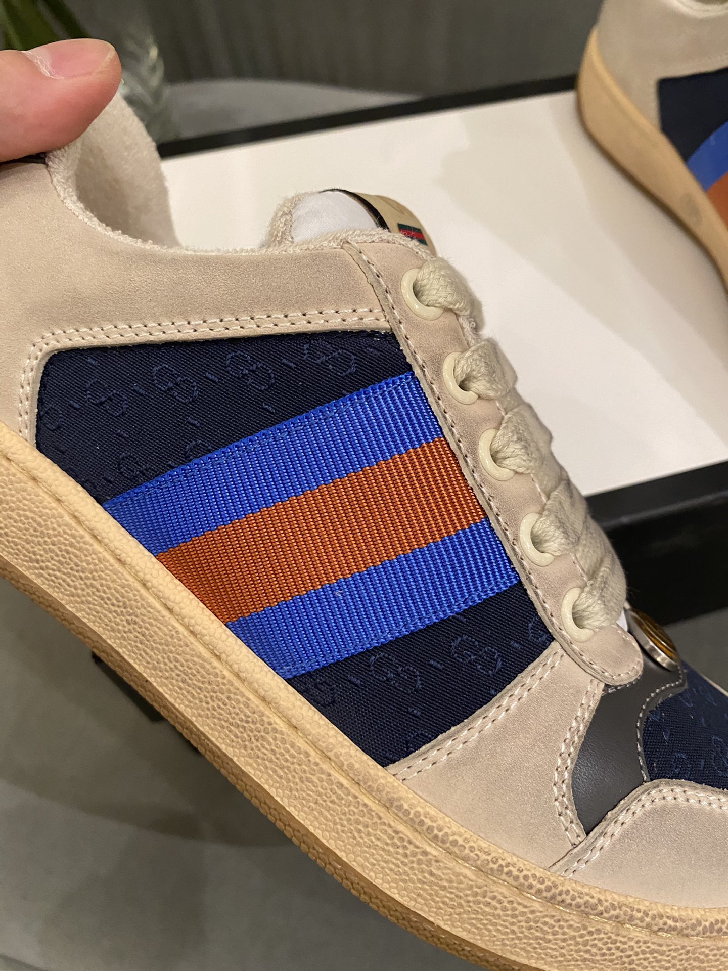 G*u*i sneakers