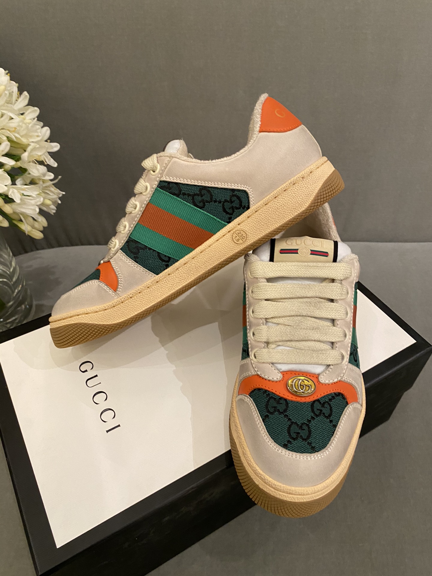 G*u*i sneakers