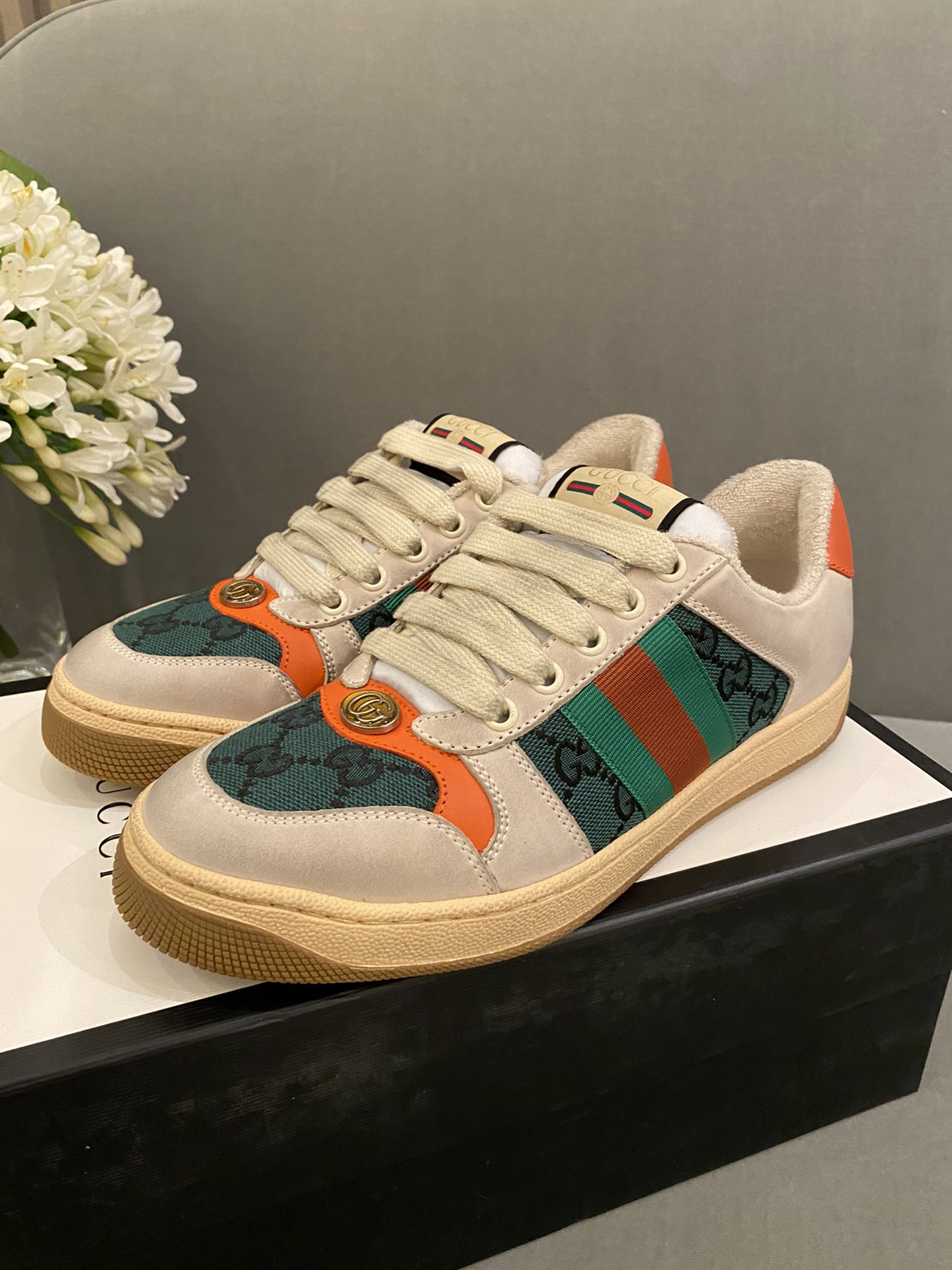 G*u*i sneakers