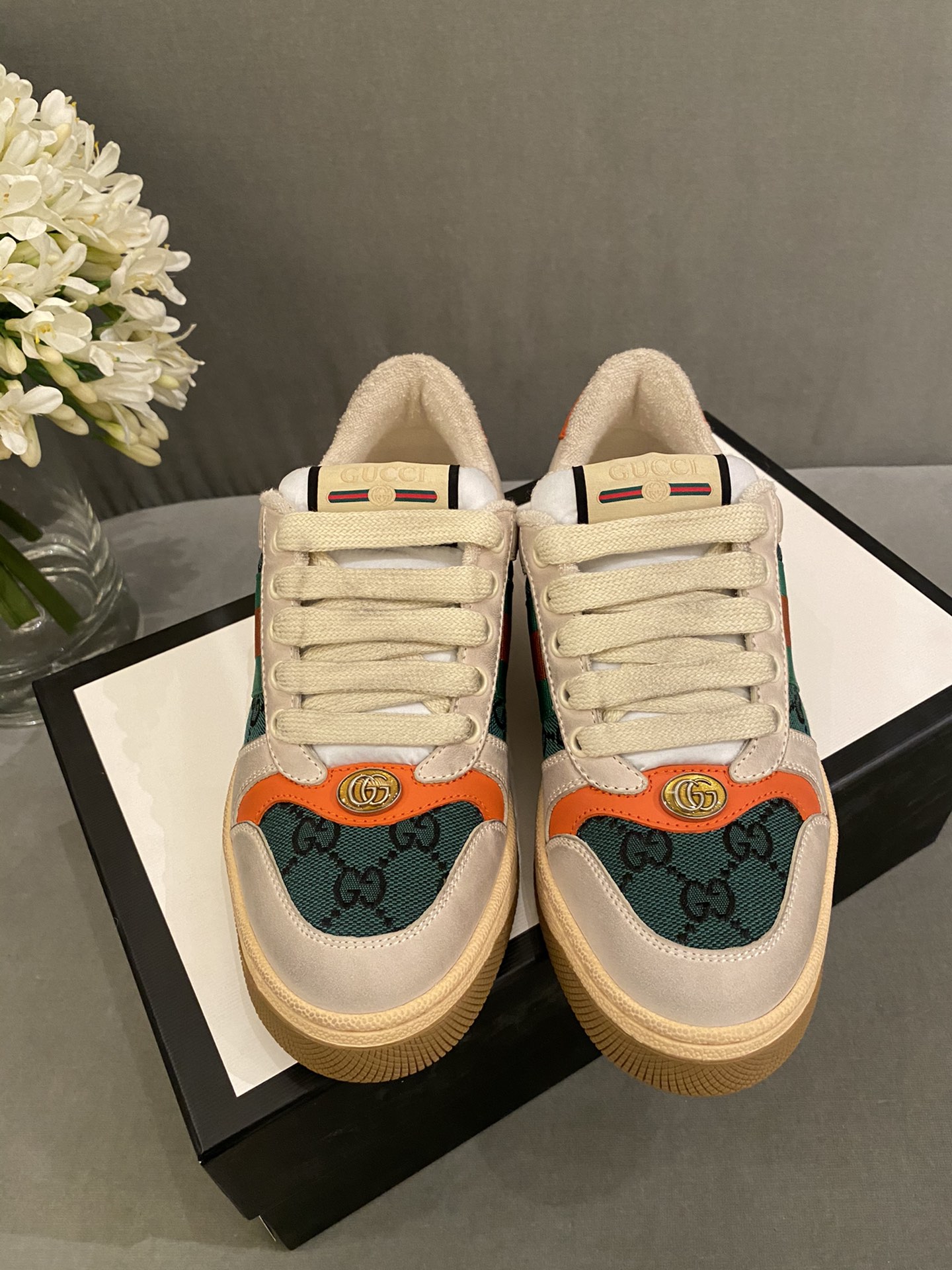 G*u*i sneakers