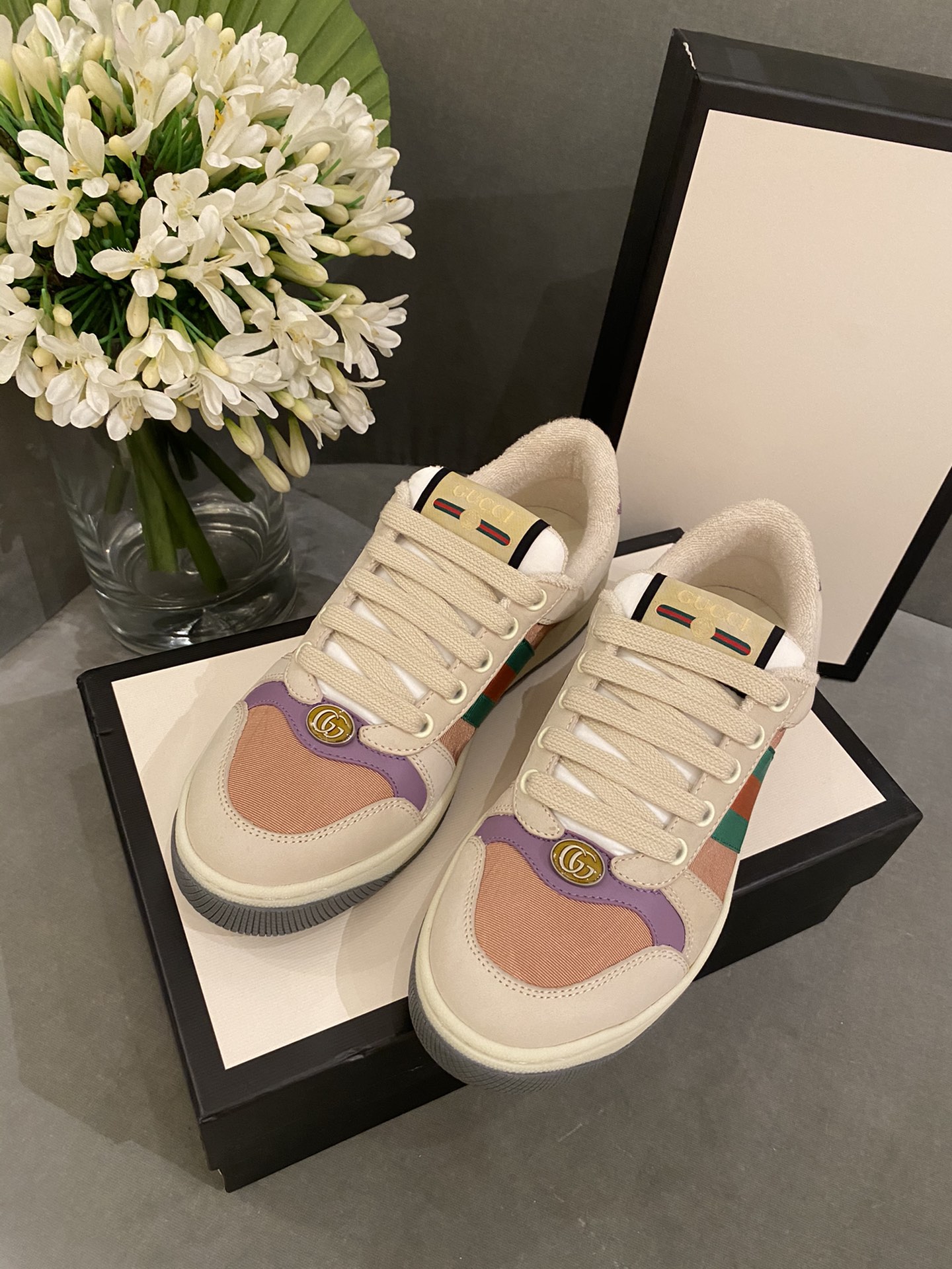 G*u*i sneakers