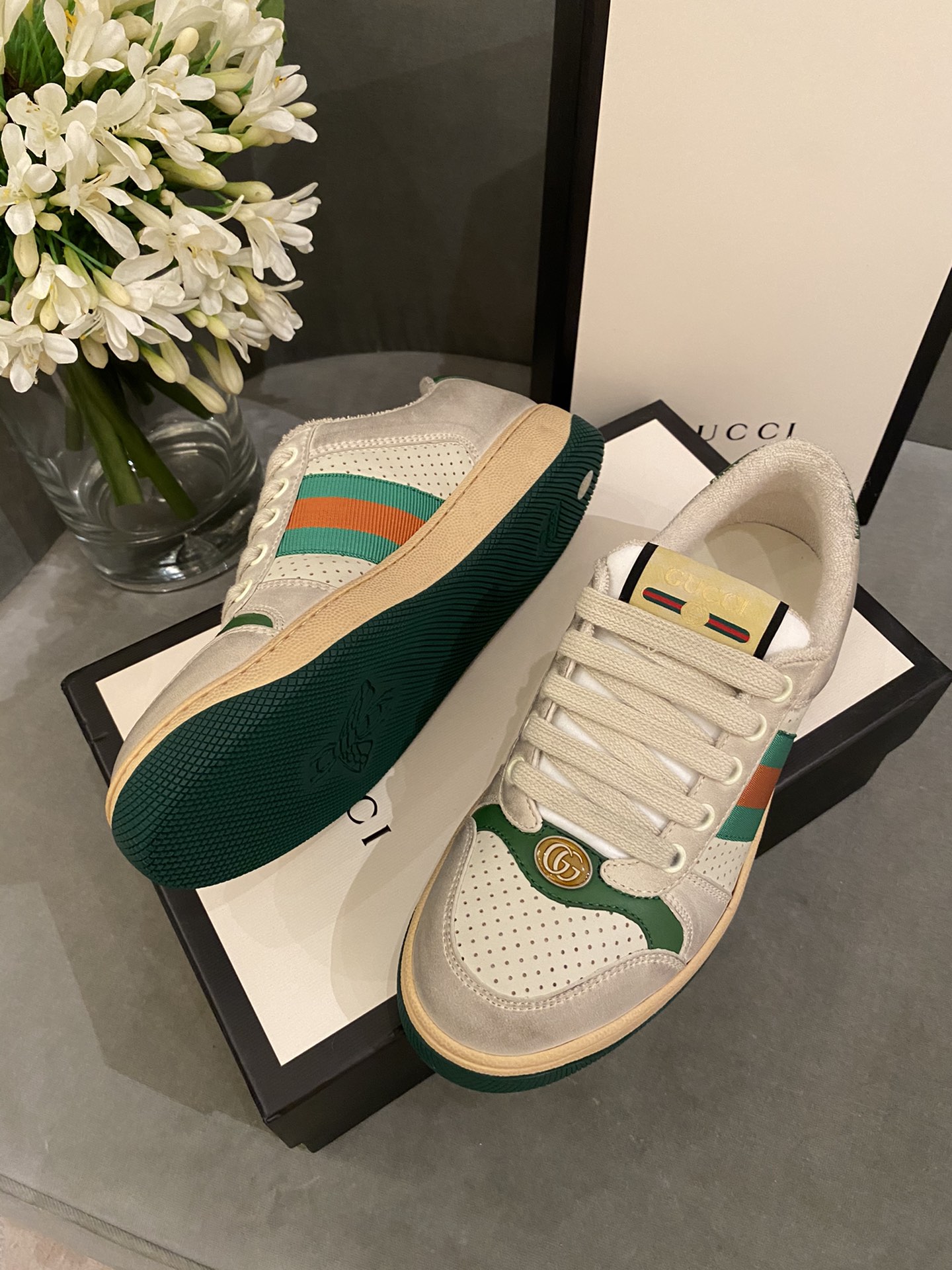 G*u*i sneakers