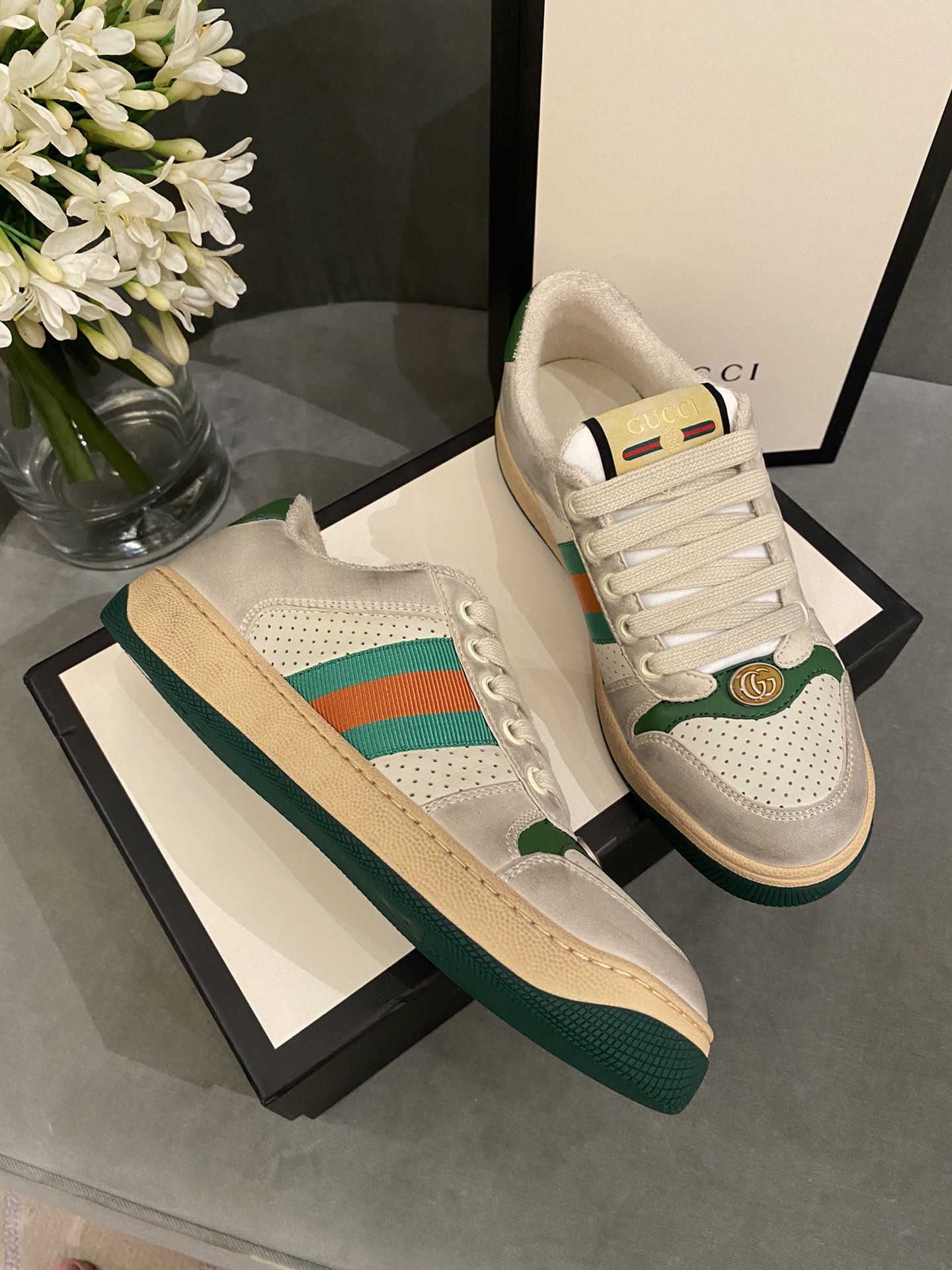 G*u*i sneakers