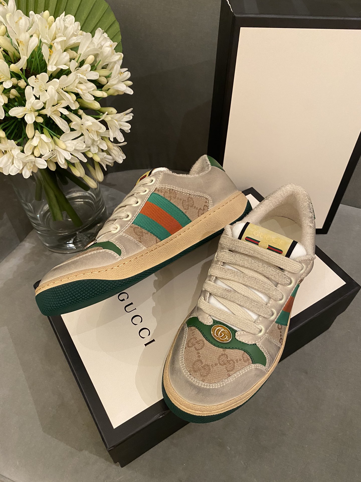 G*u*i sneakers