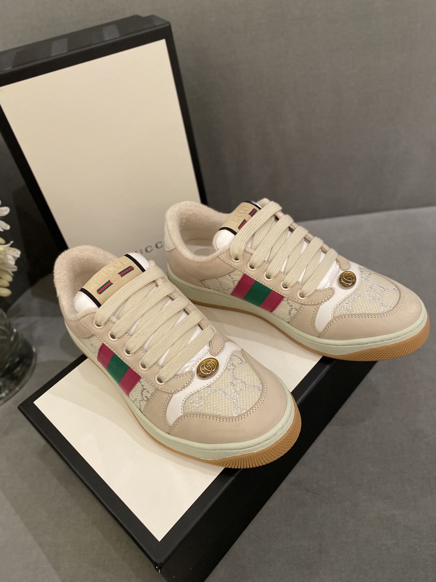 G*u*i sneakers