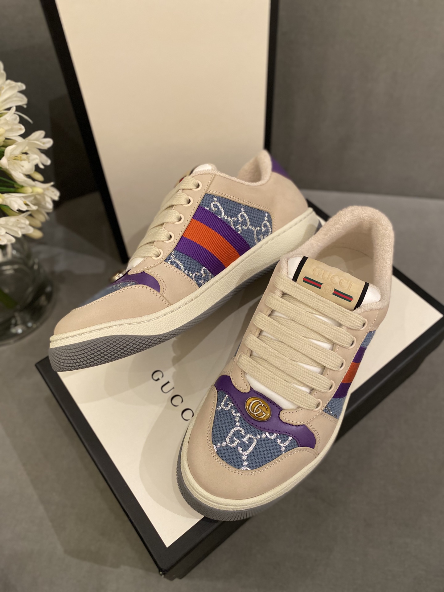 G*u*i sneakers