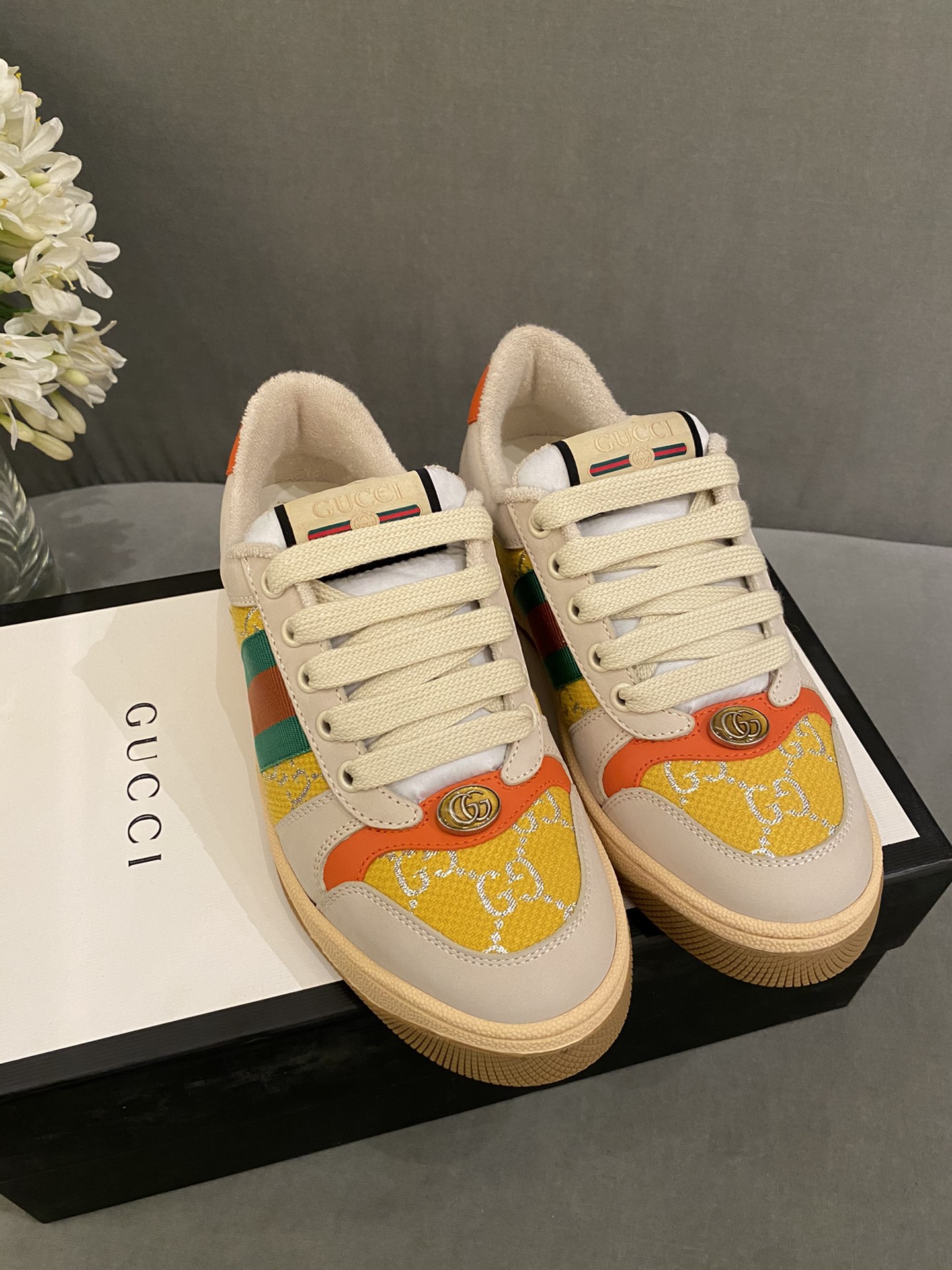 G*u*i sneakers