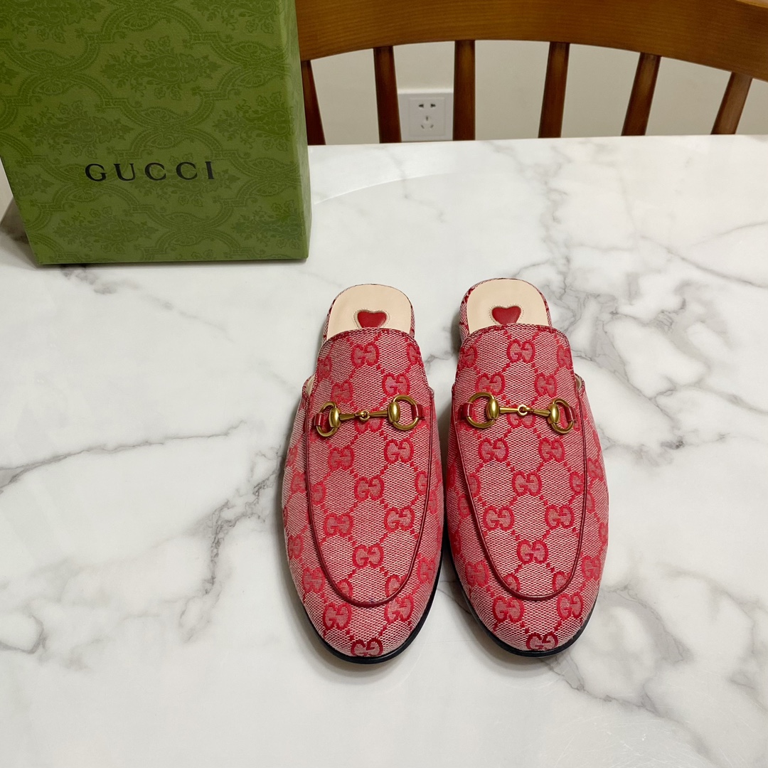 G*u*i loafers