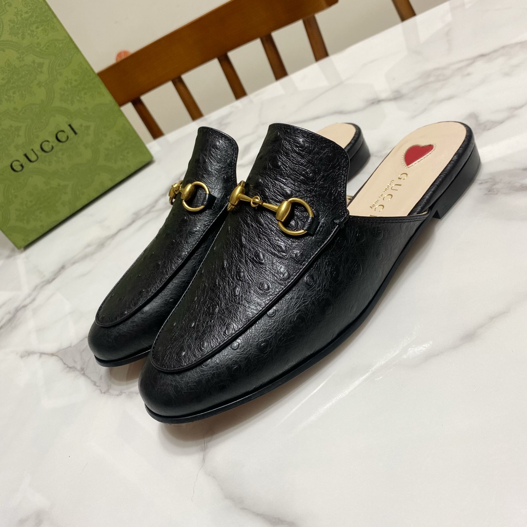 G*u*i loafers