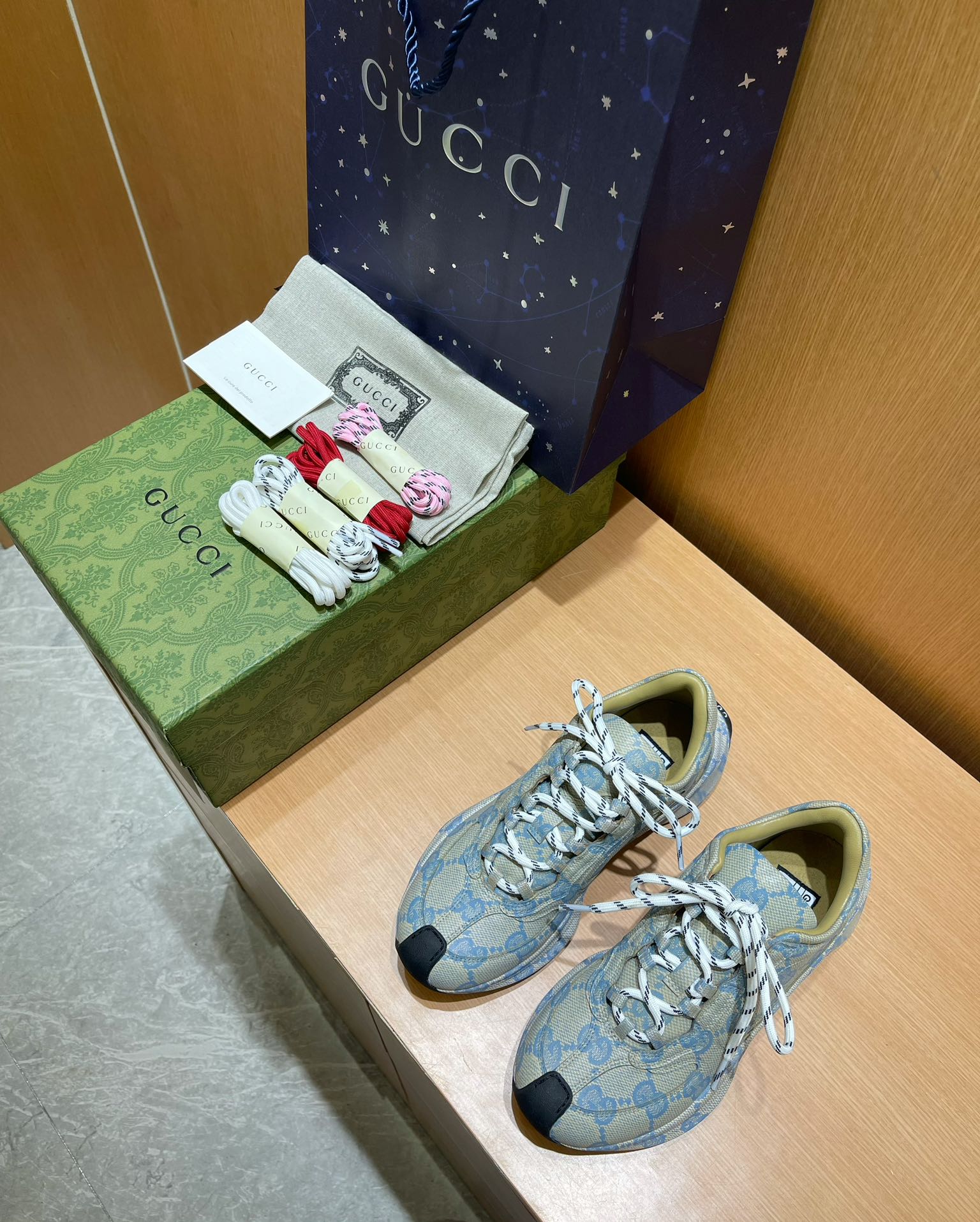 G*u*i sneakers