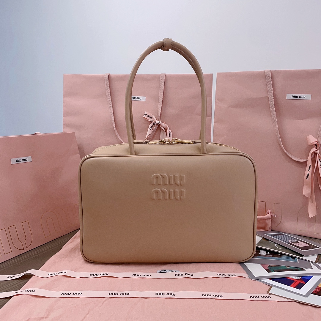 M*um*u leather top handbag-34x23x12cm