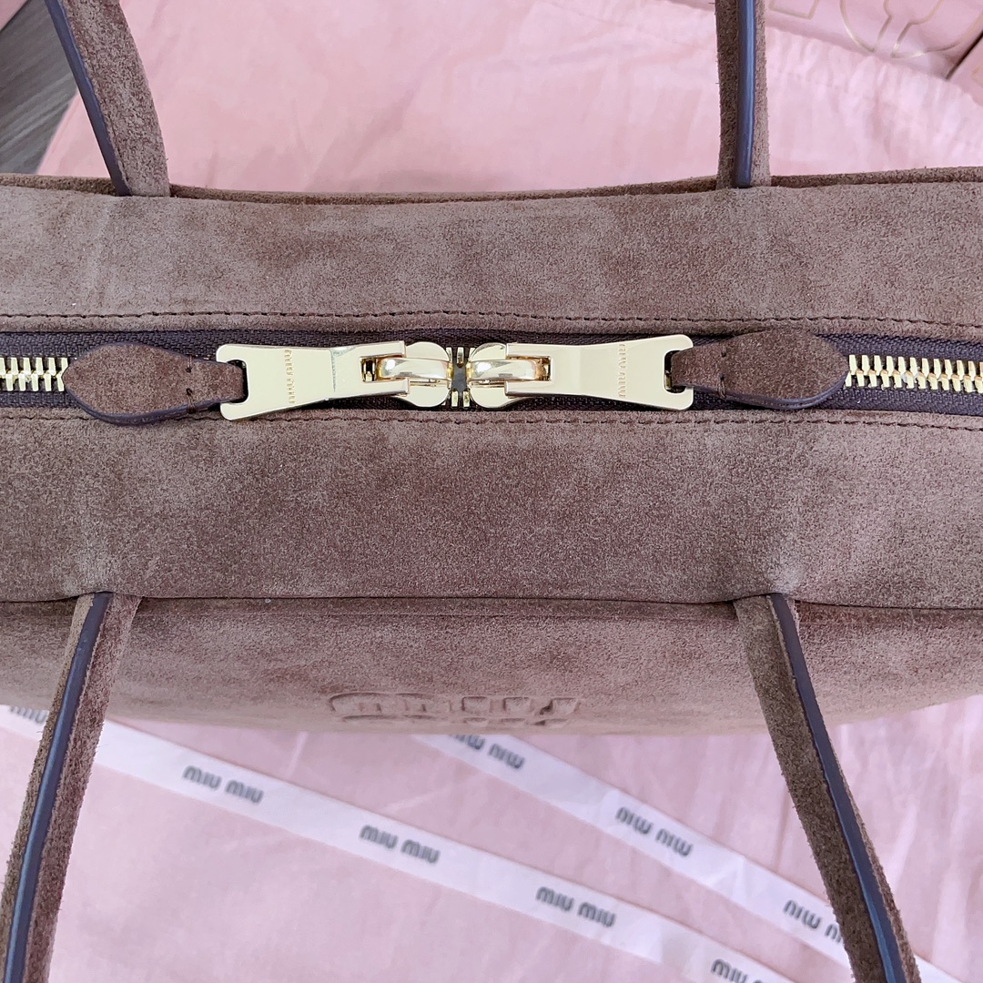 M*um*u leather top handbag-34x23x12cm