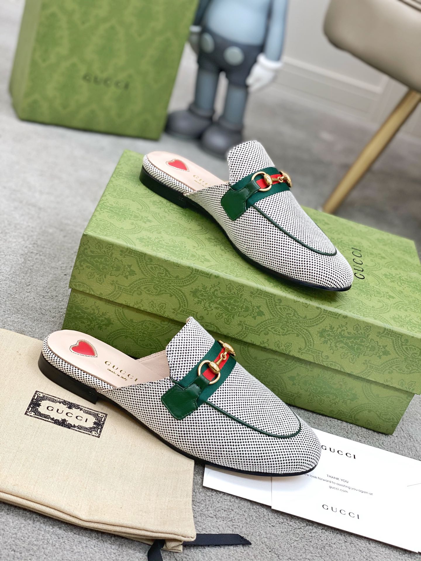 G*u*i loafers