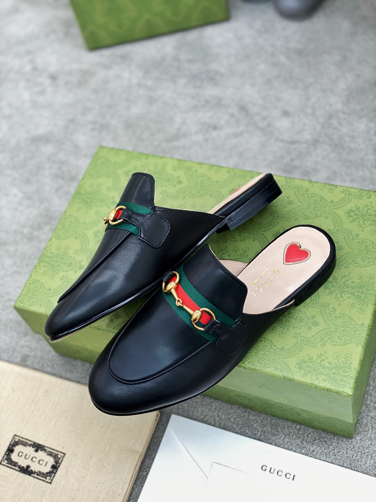 G*u*i loafers