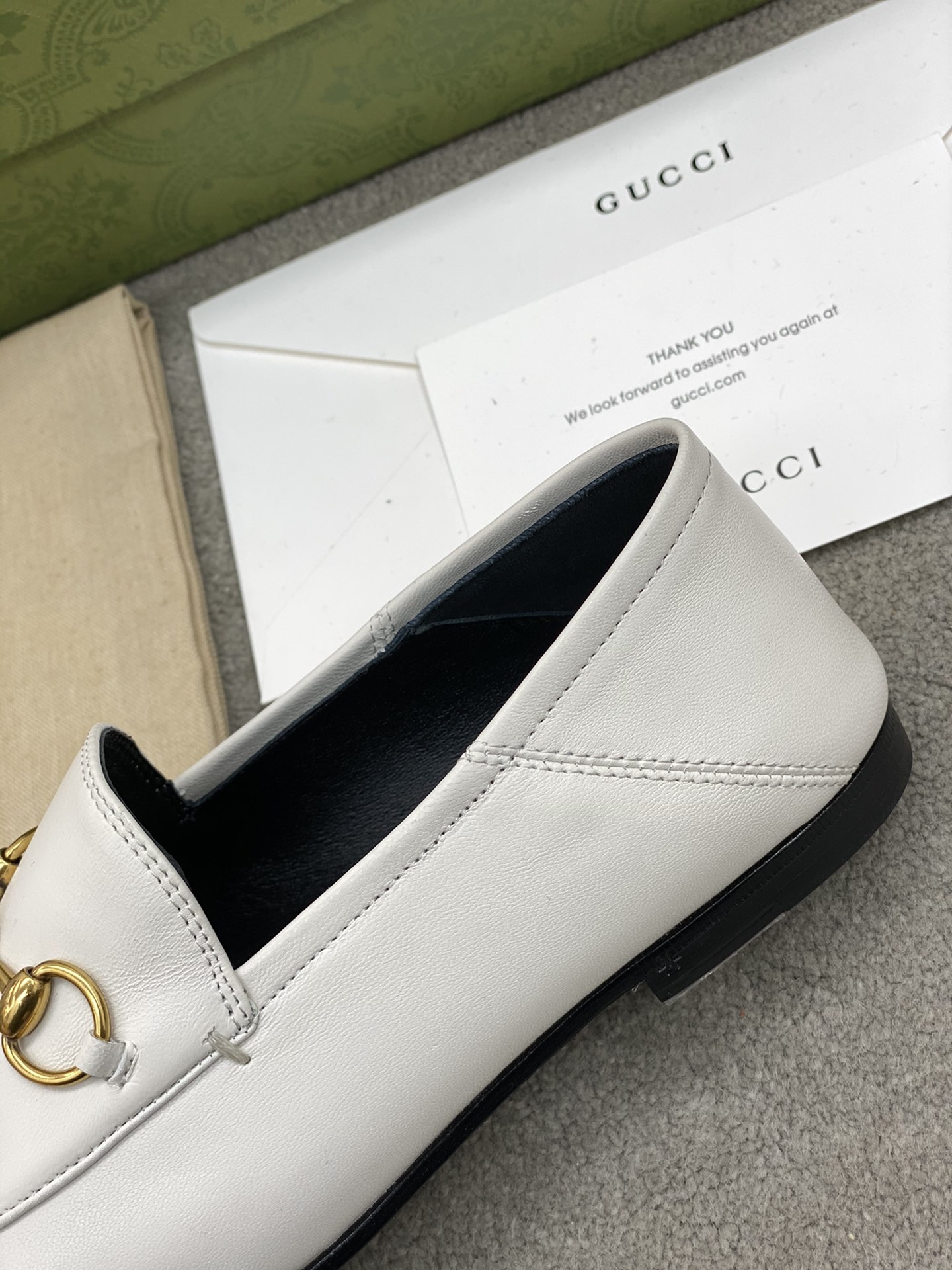 G*u*i loafers