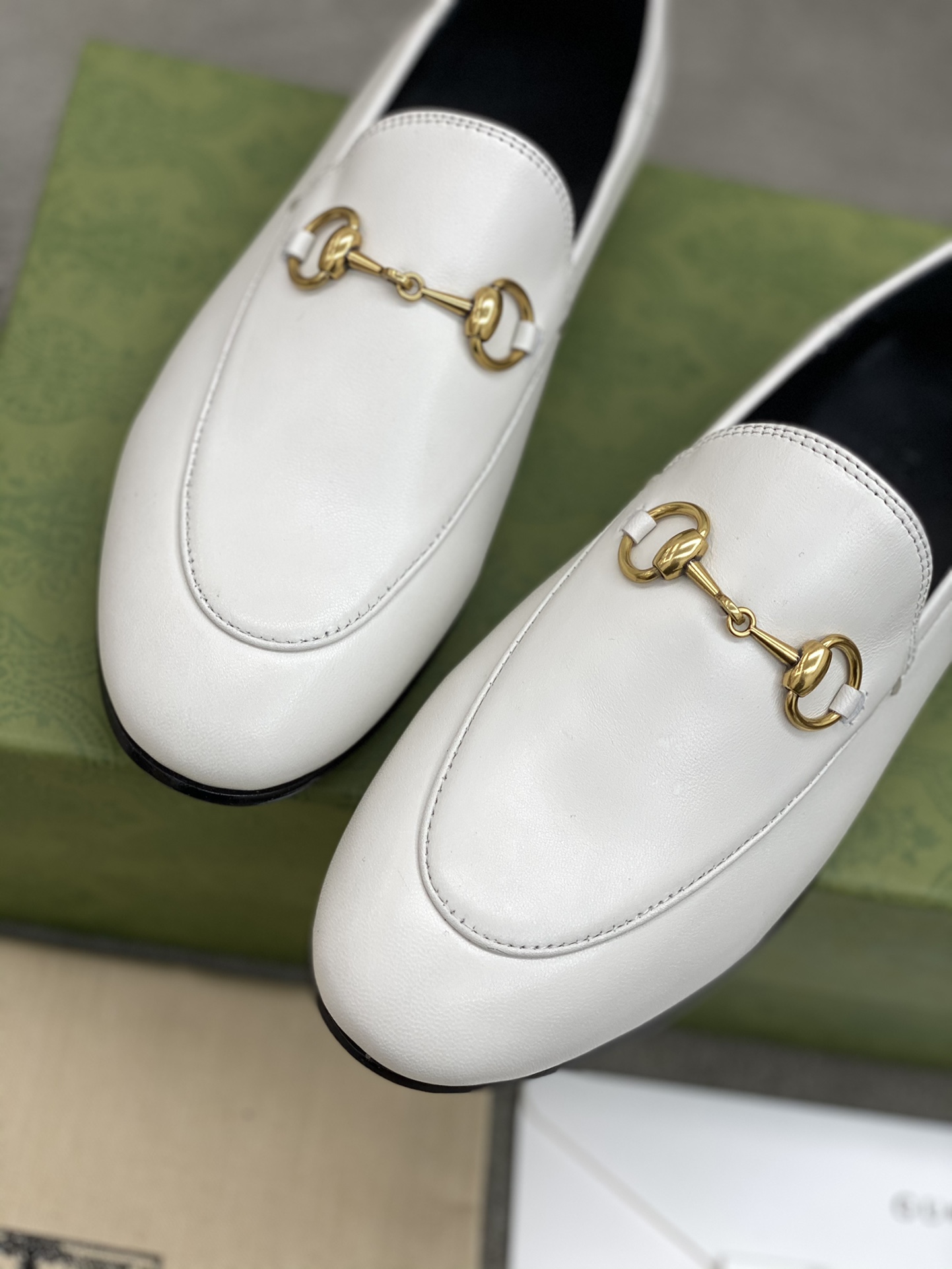 G*u*i loafers
