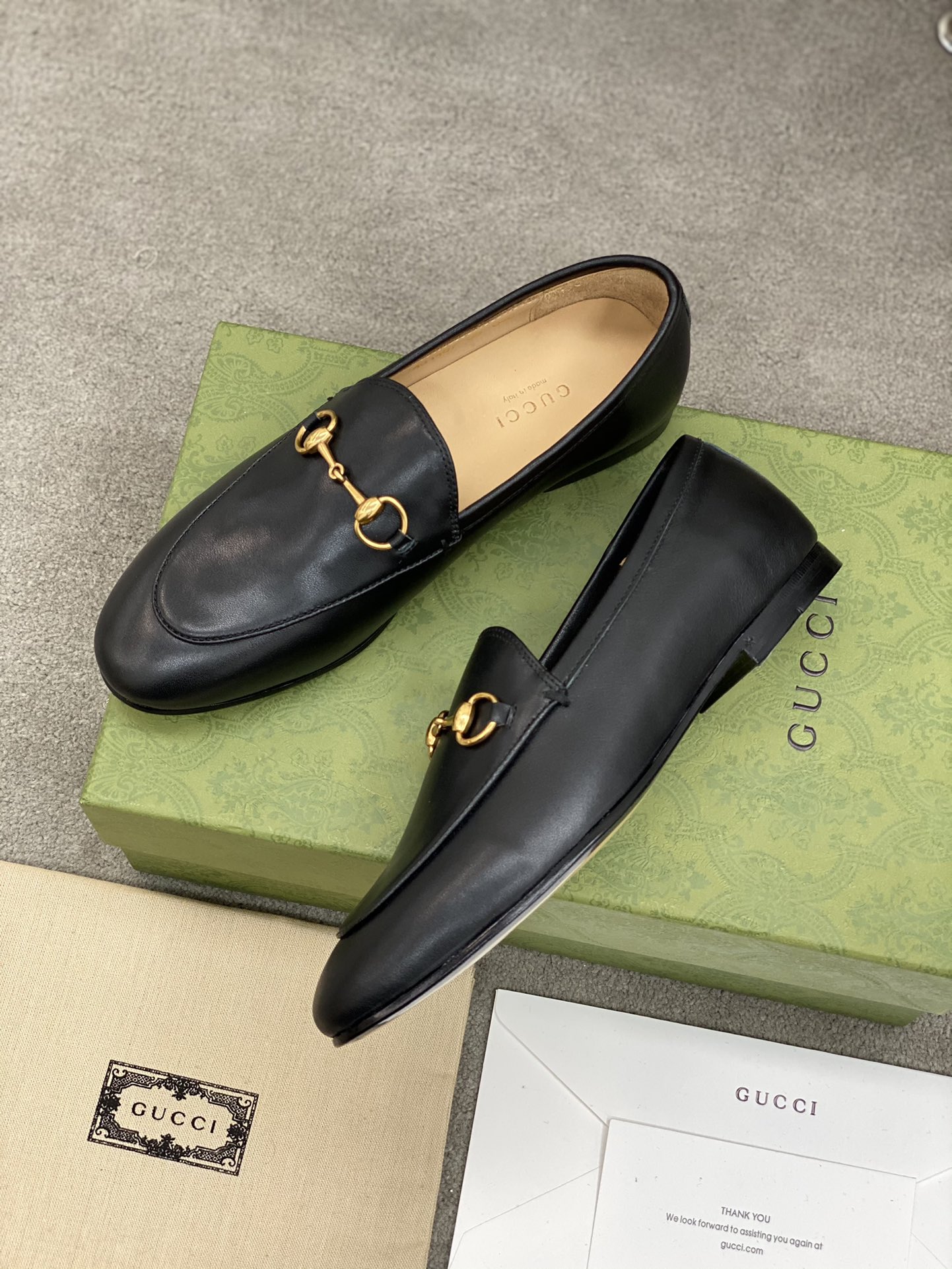 G*u*i loafers