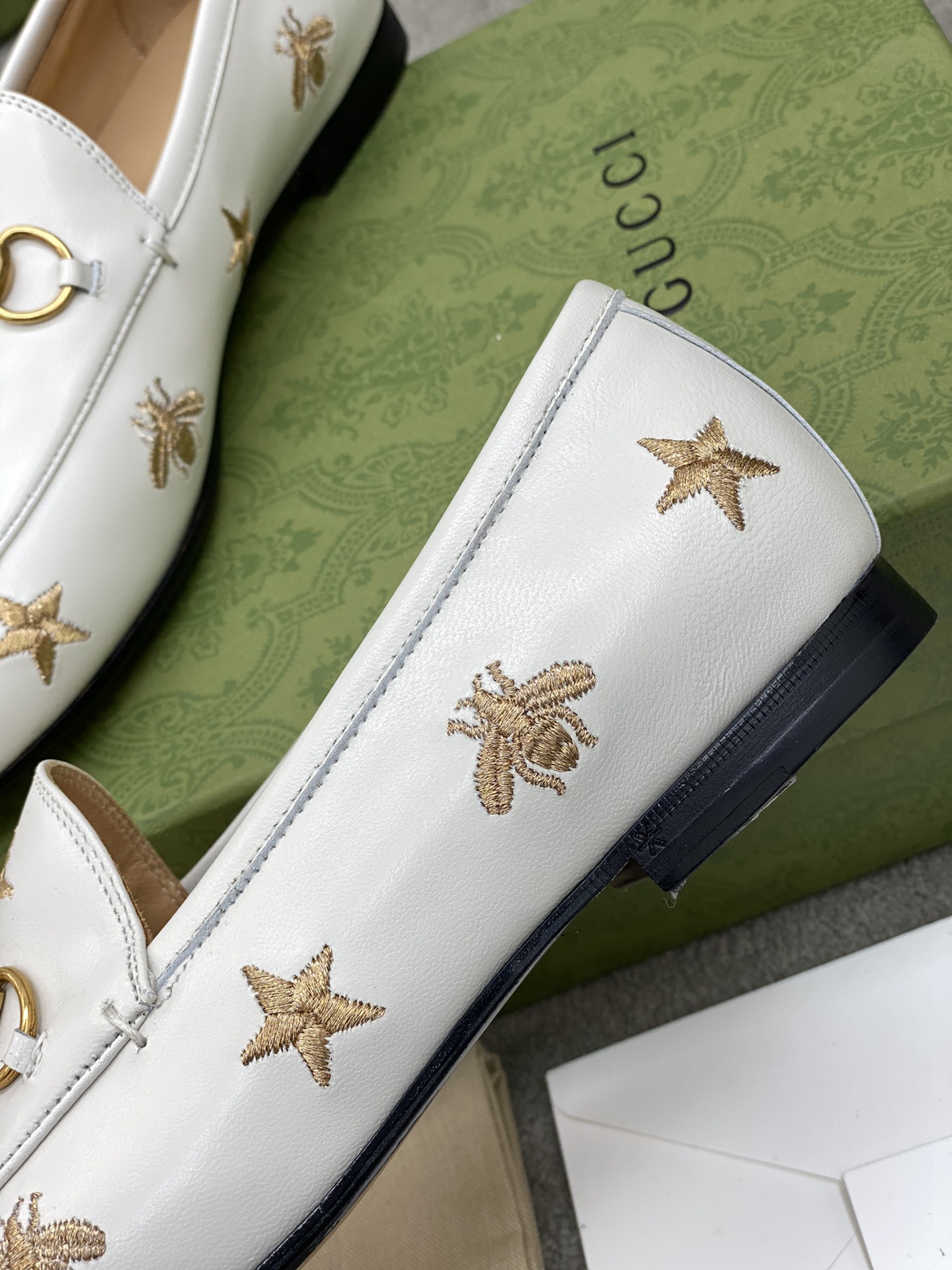 G*u*i loafers