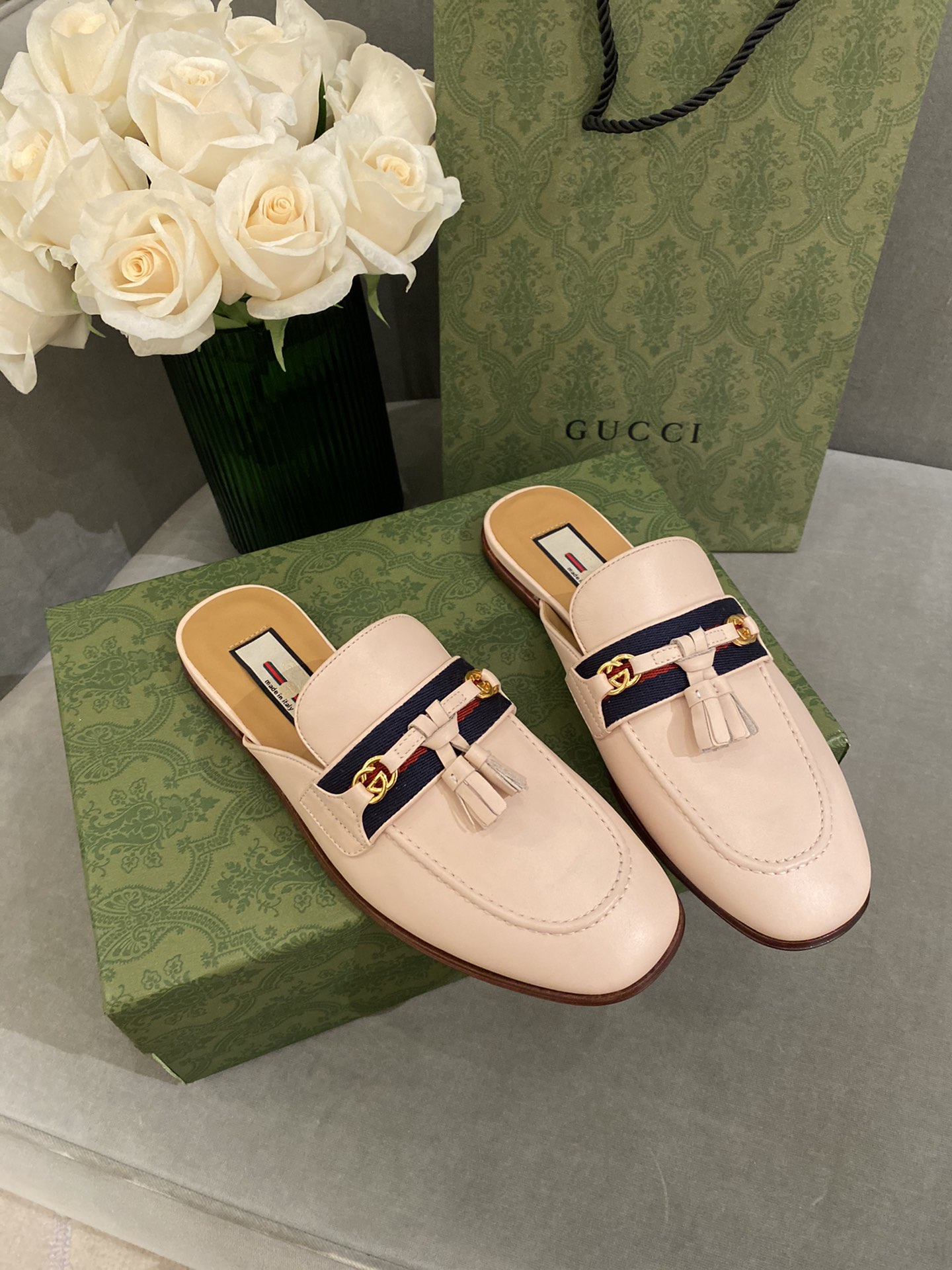 G*u*i loafers