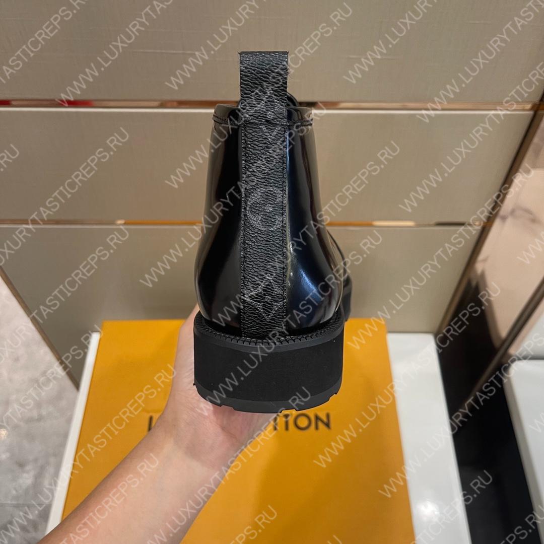 l**is V*t*n boots black 1a9a8g
